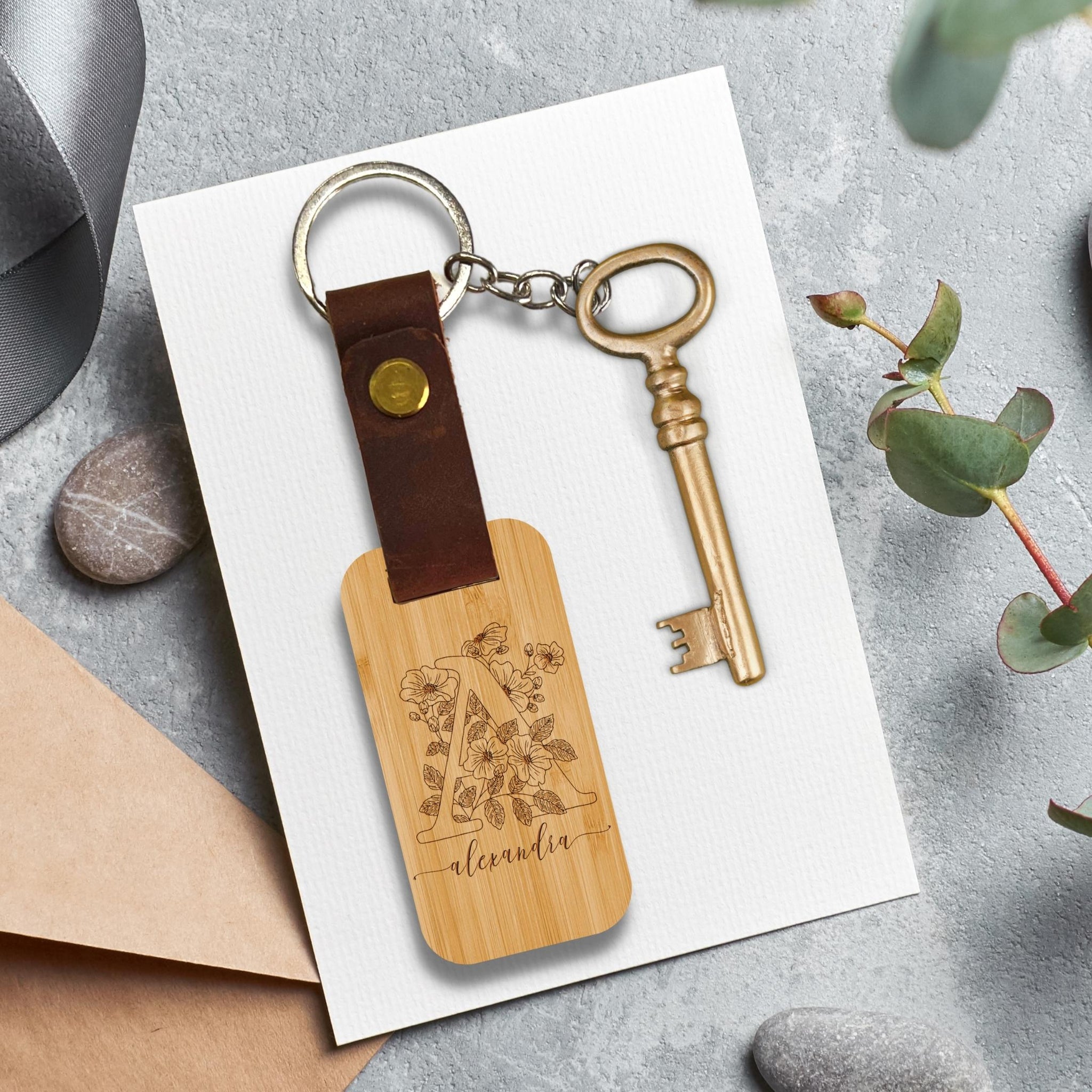 Image 3 of 10: Custom engraved wood and leather keychain, personalized gift idea.