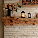 Rustic wood fireplace mantel shelf in a living room, showcasing its natural beauty. 2 of 3.